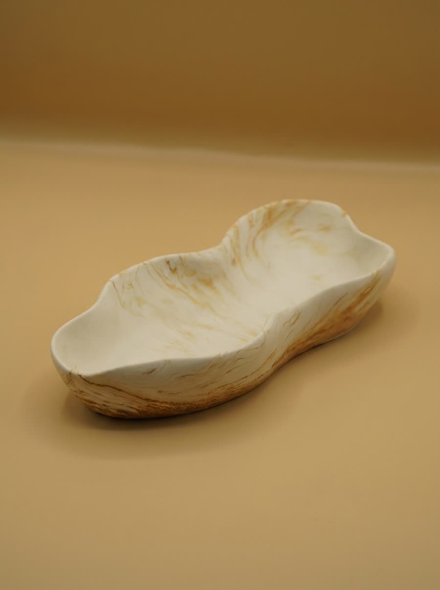Long curved leaf-shaped serving dish
